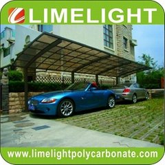 Extended aluminum carport with bronze frame and bronze polycarbonate solid sheet